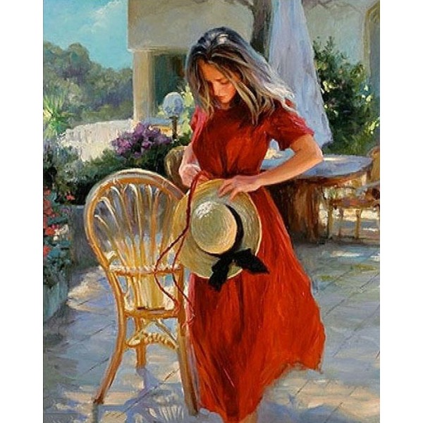 Girl in Red Dress Holding Hat